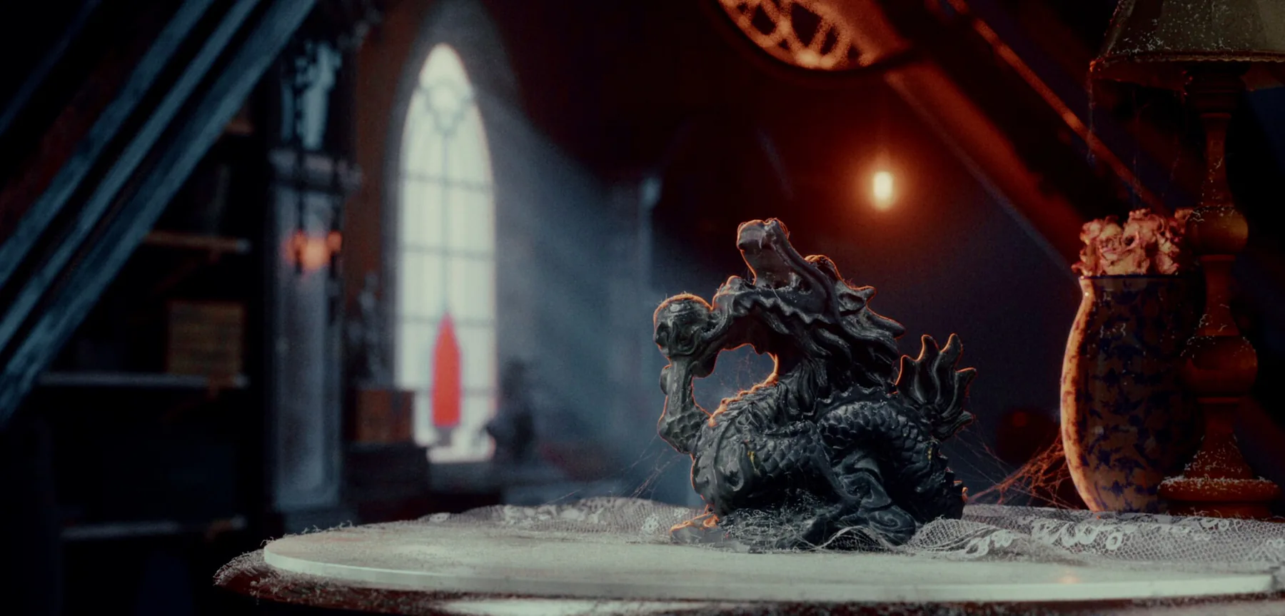 Final lit render of the Attic Dragon scene with integrated spiderwebs